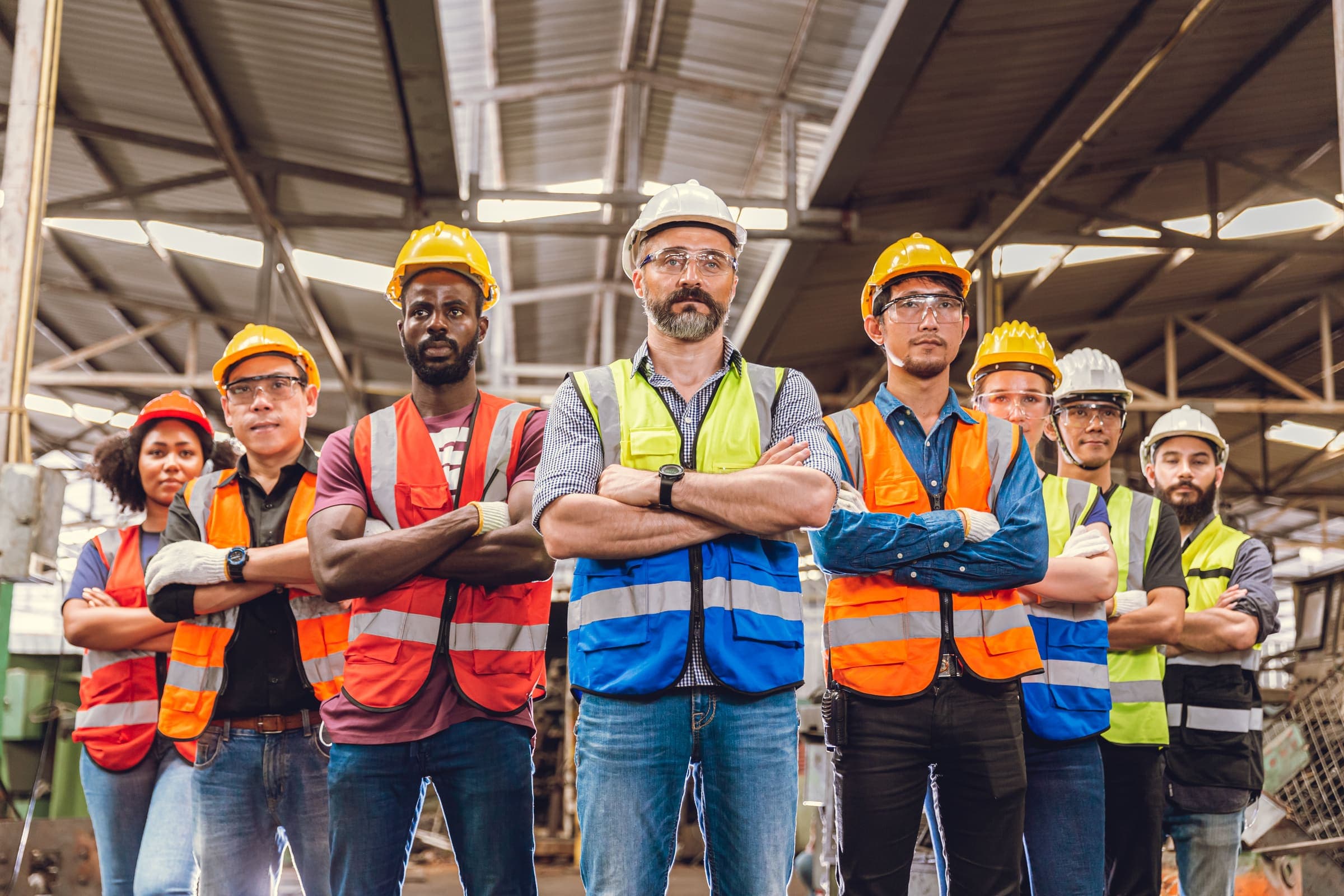 Team of engineers working together at an industrial factory