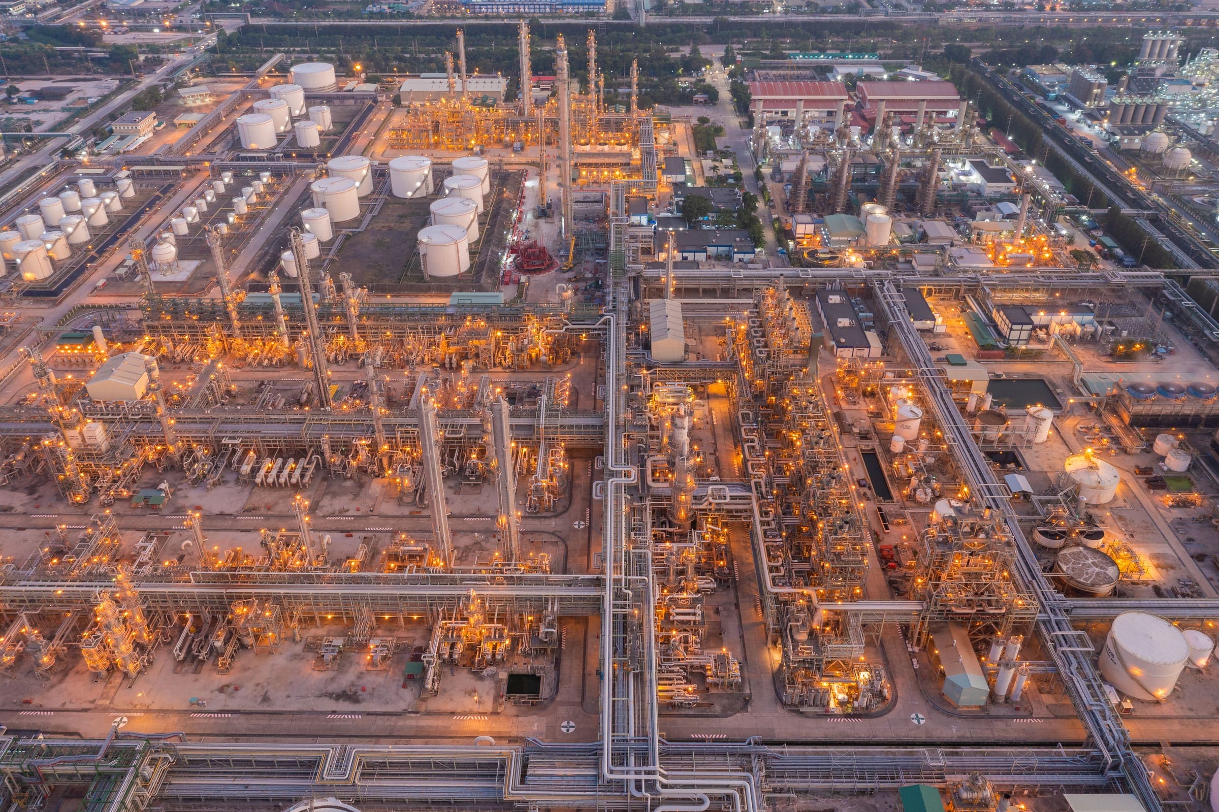 Aerial view of an industrial plant lit up at night
